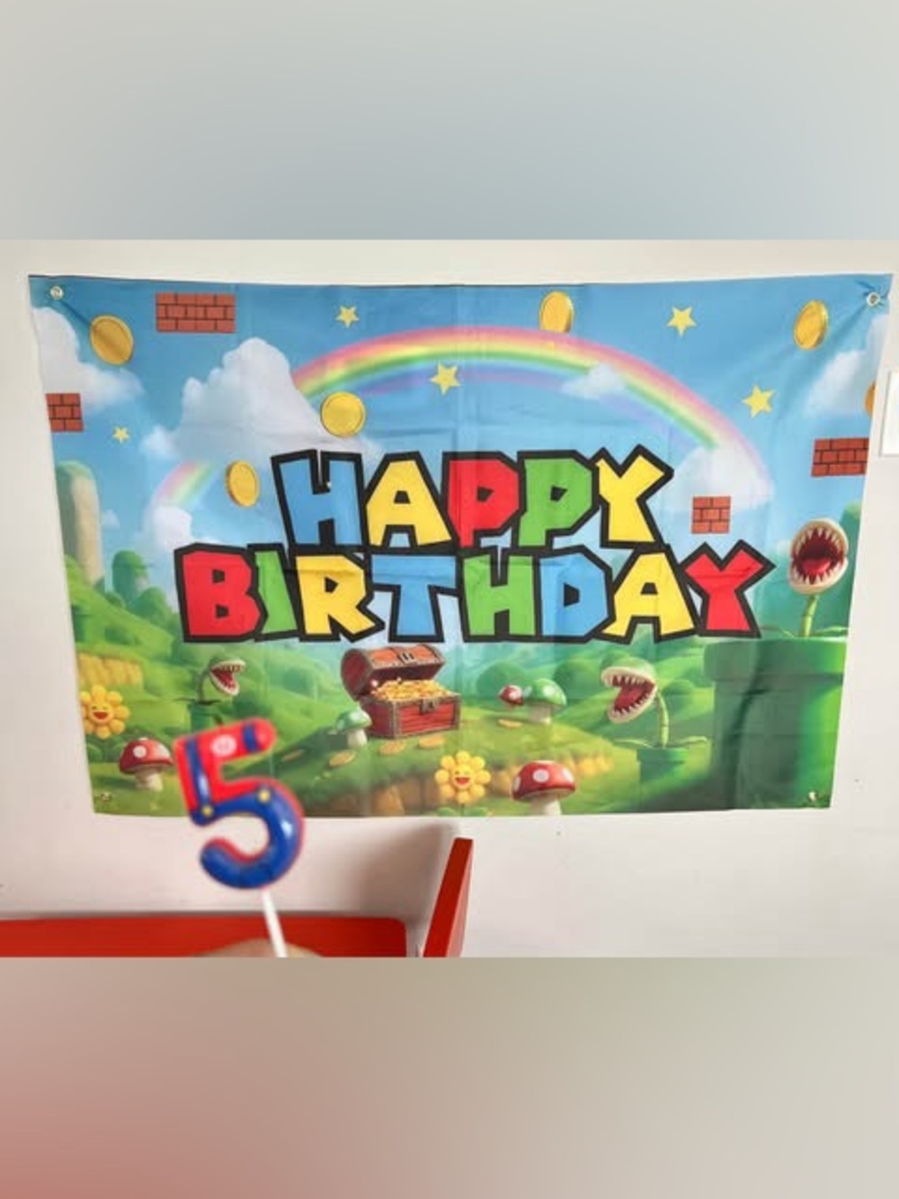 Mario themed banner and #5 candle